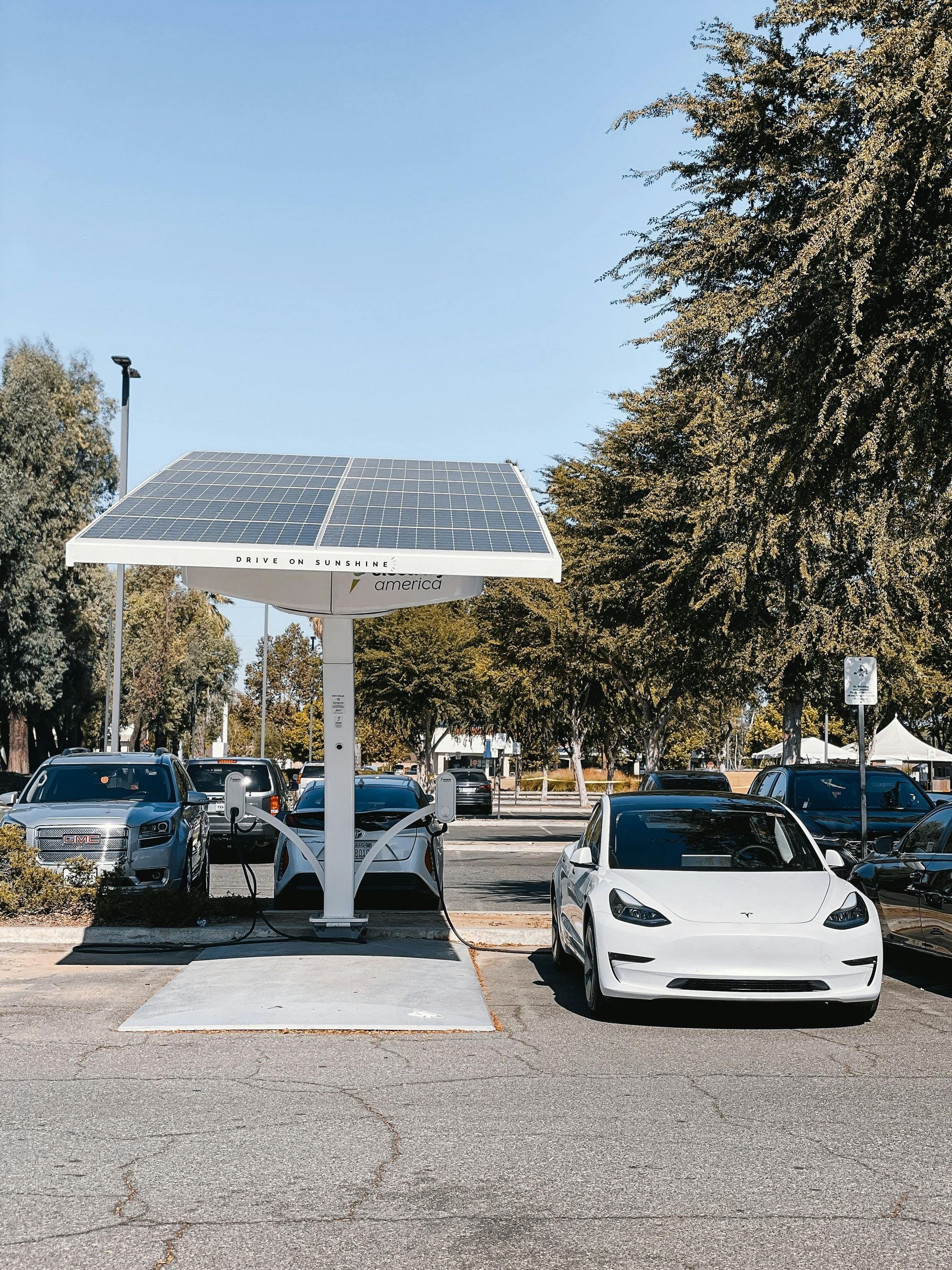 Electric vehicle charging equipment connected to a vehicle.